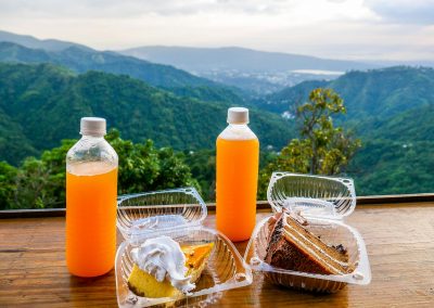 Natural juice and cake in Blue Mountains overlooking Kingston, Jamaica