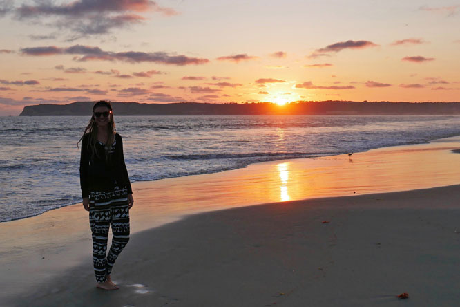 Rasta girl during sunset at Coronado Beach in San Diego, CA