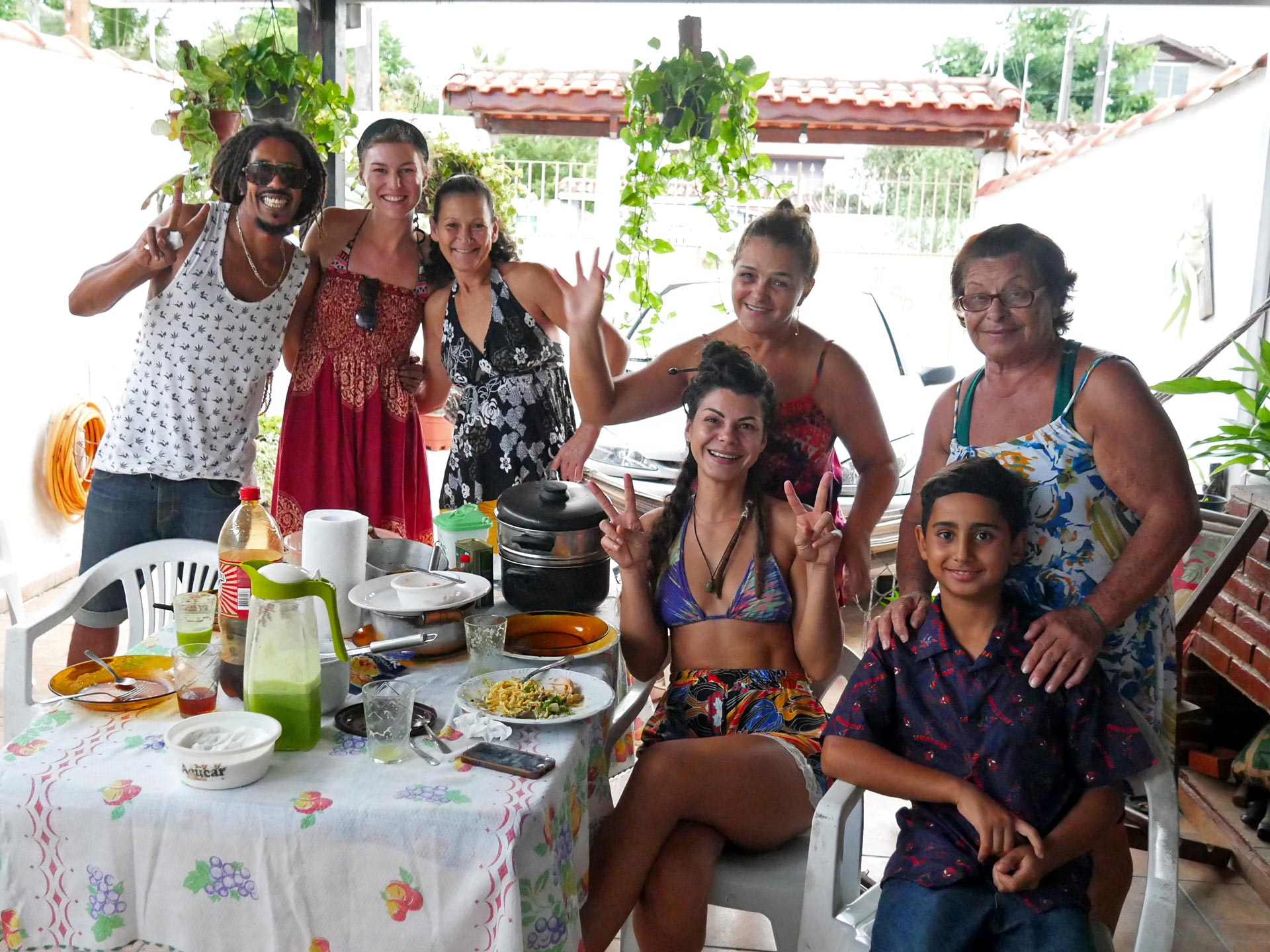 Rasta couple with family of Couchsurfing host in Peruibe, Brazil