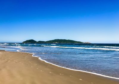 Campeche beach with island in Florianópolis, Brazil