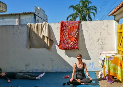 Rasta girl and friend meditating in Peruíbe, Brazil